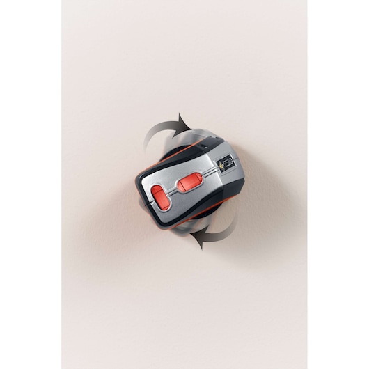 BLACKDECKER BDL220S laser level with two red buttons, mounted on wall, photography top view.