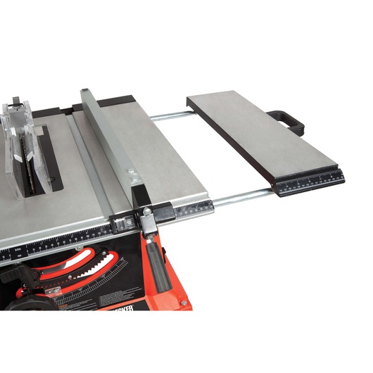 Photo of BLACK+DECKER BDTS1800 table saw close-up, showing metal extension table and measurement guides, white background.