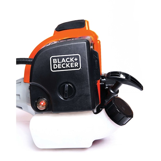 Photo of BLACK+DECKER GST26 grass trimmer engine unit, black and orange, close-up angle on white background.